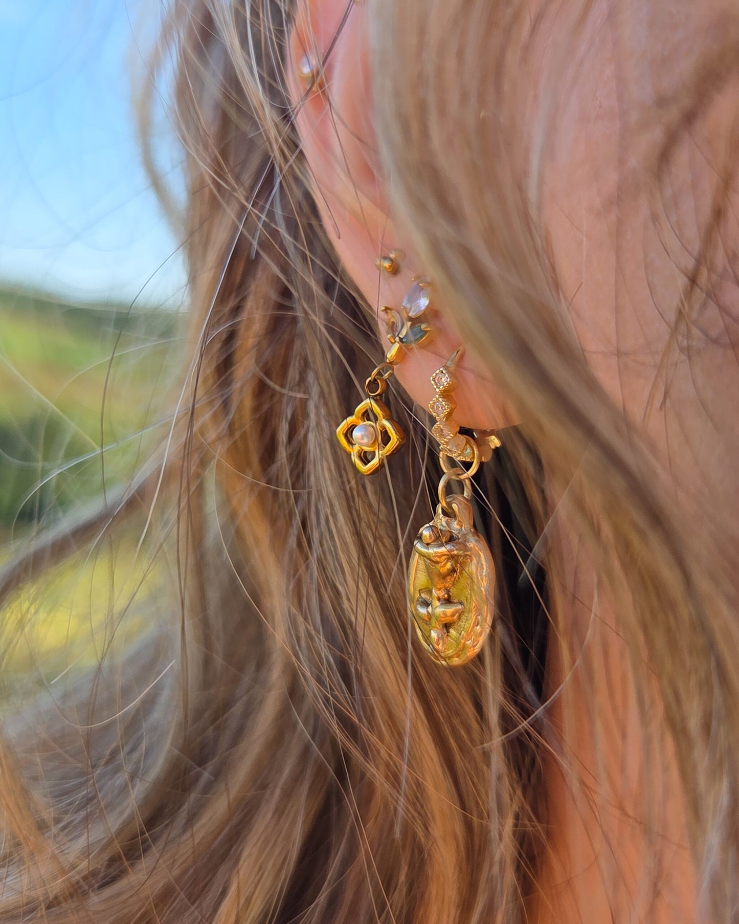 Oval floral pendants